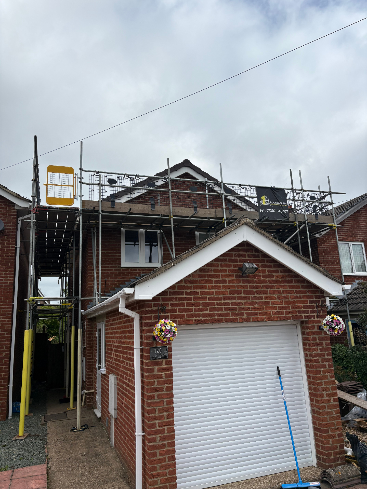 Chimney scaffolding on a pitched roof
