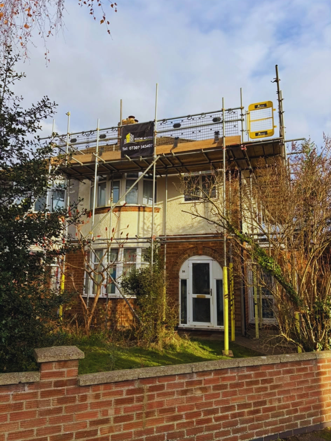 Roche Access Scaffolding roof scaffold with branded banner