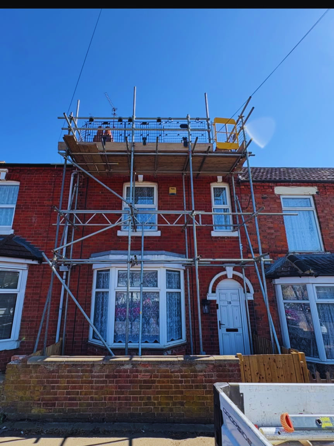Roof scaffolding to a bay-fronted terraced property